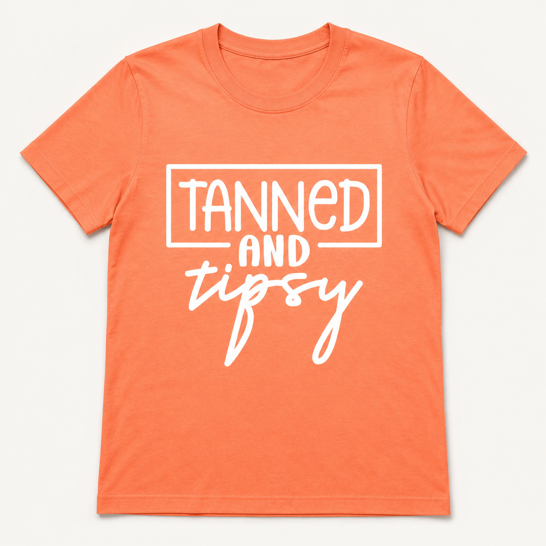 Tanned and Tipsy neon cantaloupe graphic tee on a clean studio background