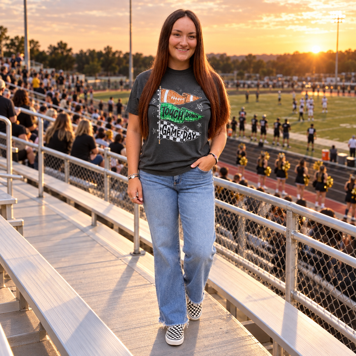 Woman wearing Touchdown Flags Pepper football graphic tee in stadium bleachers