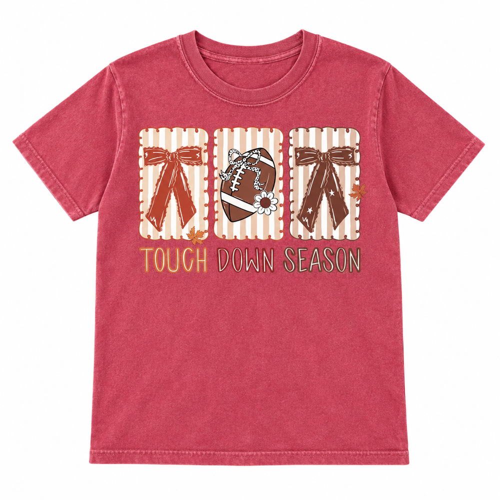Touchdown Season Bows crimson football tee, white background flat lay
