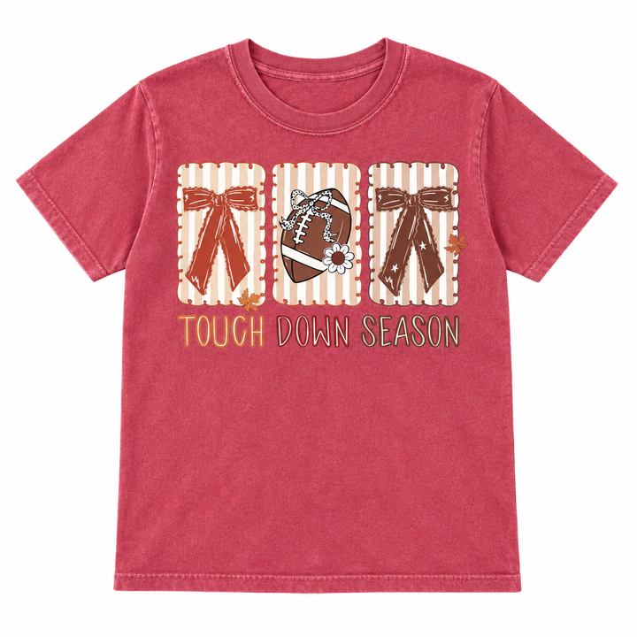 Touchdown Season Bows crimson football tee, white background flat lay