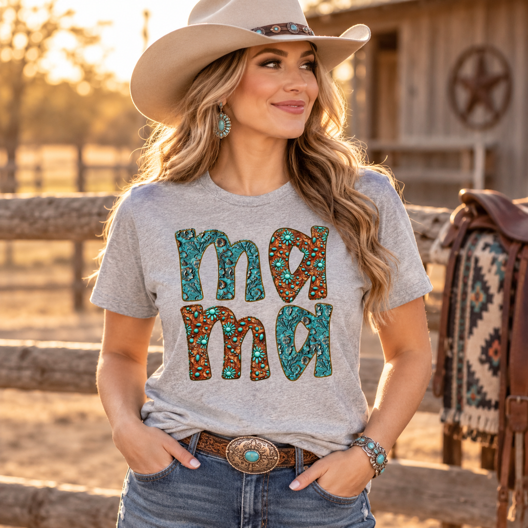 Woman wearing Western Mama concho grey graphic T-shirt in a ranch setting