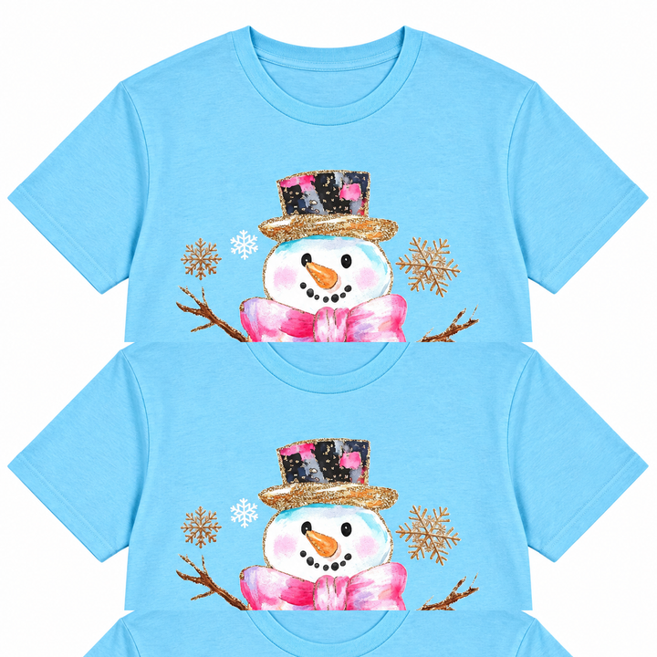 Light blue Western snowman brush Christmas graphic tee laid flat on pure white